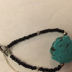 This rock bracelet is made  of string